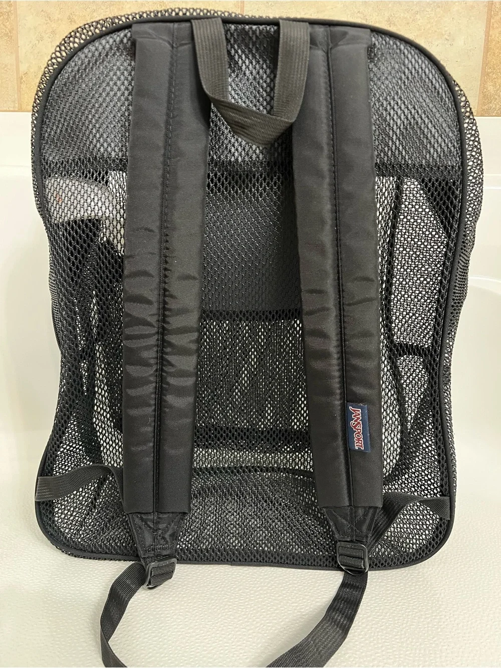Jansport Black Mesh Backpack with Front Zip Pocket